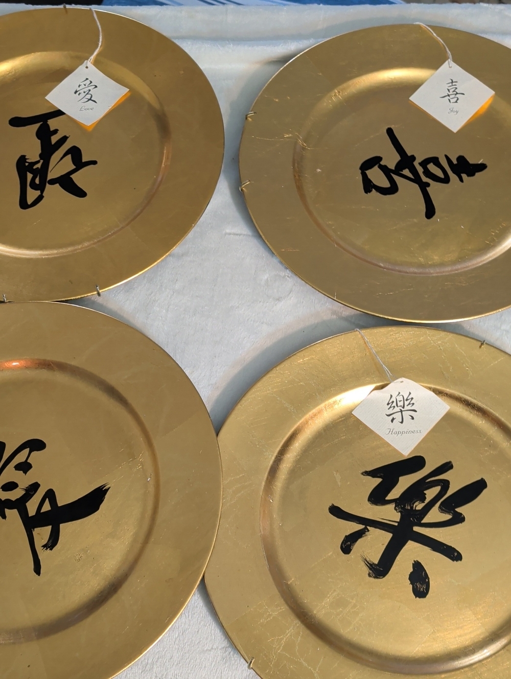 Gold Charger Plates with Black Calligraphy – Set of 4
